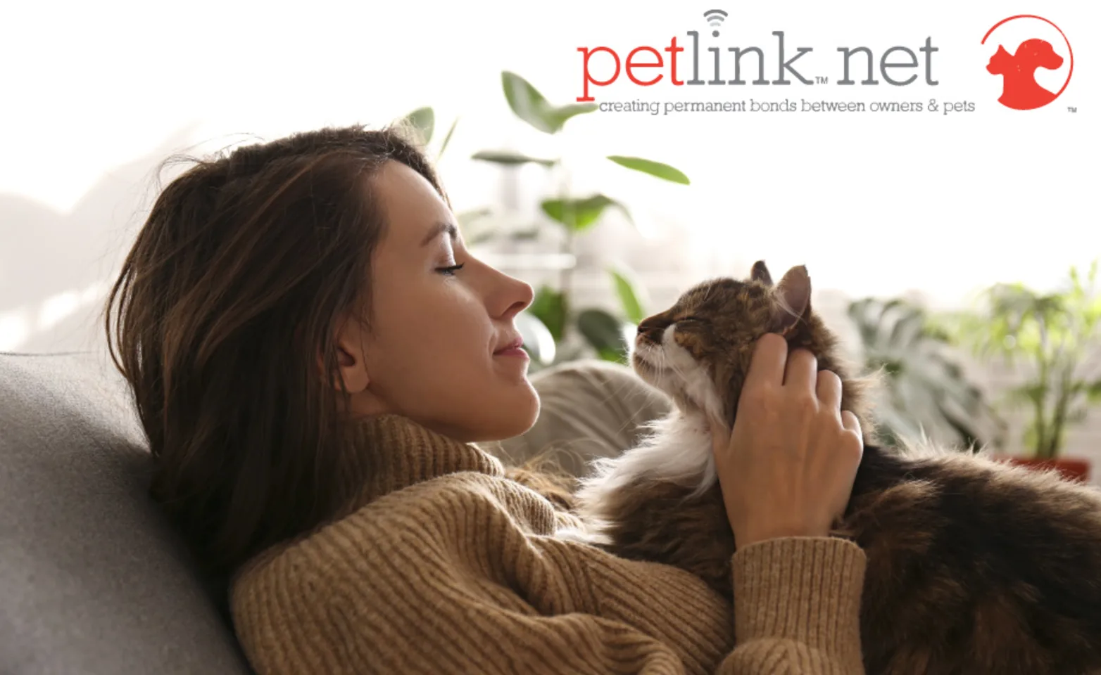 PetLink logo with women and cat nose 
